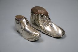 Two early 20th century novelty silver mounted pin cushions, modelled as shoes, Levy & Salaman,