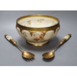 A late Victorian Royal Worcester ivory porcelain salad bowl and servers, with gilt metal mounts,