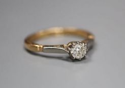 An 18ct and plat, solitaire diamond ring, size M, gross 2.6 grams, the stone weighing