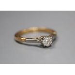 An 18ct and plat, solitaire diamond ring, size M, gross 2.6 grams, the stone weighing