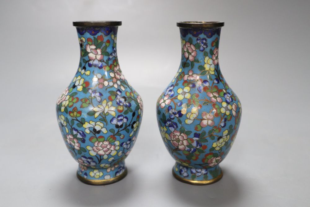 A pair of small Chinese cloisonne vases, 13cmCONDITION: One vase with two dents with damage to