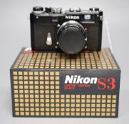 A Nikon S3 Limited Edition block range finder camera, serial no 303307 with Nikkor F/1.4 500mm lens,