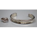 A modern Tiffany and Co 925 snake ring, size M and a Tiffany & Co 925 bangle, both with pouch and