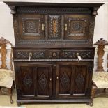 A late 18th century carved oak court cupboard, width 130cm, depth 52cm, height 170cm