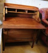 An Edwardian walnut writing desk, width 70cm, depth 57cm, height 92cm