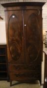 A 1920's George III style mahogany bow front wardrobe with two drawers, with key, width 102cm