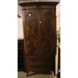 A 1920's George III style mahogany bow front wardrobe with two drawers, with key, width 102cm