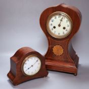 An Edwardian balloon clock, height 33cm and anotherCONDITION: Larger clock badly split at top, above
