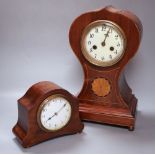 An Edwardian balloon clock, height 33cm and anotherCONDITION: Larger clock badly split at top, above