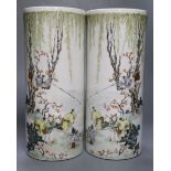 A pair of Chinese cylindrical porcelain vases, enamelled with fisherfolk, 29cmCONDITION: Good