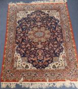 An Isphahan blue ground part silk rug, 142 x 105cmCONDITION: Would benefit from a thorough clean