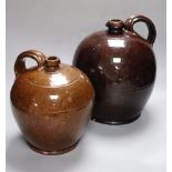 Two 19th century Sussex glazed terracotta jugs, tallest 28cmCONDITION: Both have shallow chipping