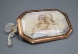 A 19th century yellow metal mounted glazed miniature portrait octagonal brooch, painted with two