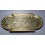 A 19th century Middle - Eastern engraved brass tray, 53cm wide