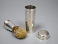 A Victorian silver cylindrical cased travelling shaving brush, Thomas Johnson I, London, 1869, 75mm,