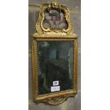 A gilt framed wall mirror, 26 x 51cm