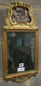 A gilt framed wall mirror, 26 x 51cm