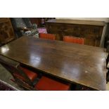 An 18th century-style oak refectory dining table, sideboard and four chairs, table 182 x 79cm height