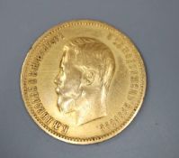 A Russian 1900 10 rouble gold coin, 8.7 grams.