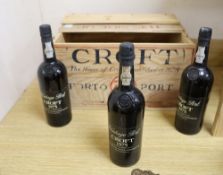 Three bottles of Croft 1975 Vintage Port, contained within original pine case