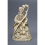 A Japanese walrus ivory figure of an immortal, height 11cm