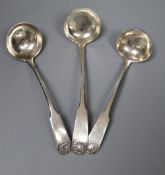 Three Scottish silver fiddle and shell pattern cream ladles, including a pair by John Zeigler,