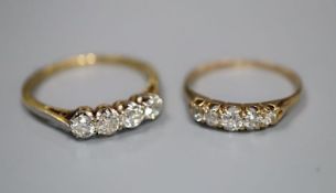An early 20th century 18ct and plat, four stone diamond ring, size O and a yellow metal and