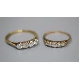 An early 20th century 18ct and plat, four stone diamond ring, size O and a yellow metal and