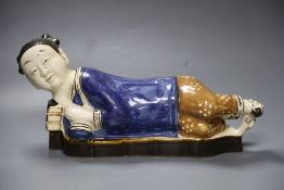 A Chinese porcelain pottery figural pillow, 42cm wide with related Hong Kong certificateCONDITION: