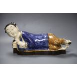 A Chinese porcelain pottery figural pillow, 42cm wide with related Hong Kong certificateCONDITION: