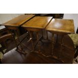 Three rectangular walnut occasional tables (formerly a nest of tables), largest width 50cm, depth