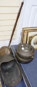 A Danish oxidised tin punch bowl, a Victorian copper coal helmet and a Victorian copper warming
