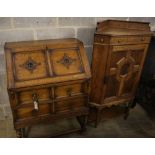A 1920's panelled oak bureau, width 74cm, depth 46cm, height 103cm, together with a similar standing