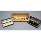 Six 9ct dress studs in two cases and one other cased set of six dress studs, 9ct- gross 3.4 grams.,