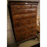 An early 18th century banded walnut tallboy, with oak sides, width 108cm depth 55cm height 180cm