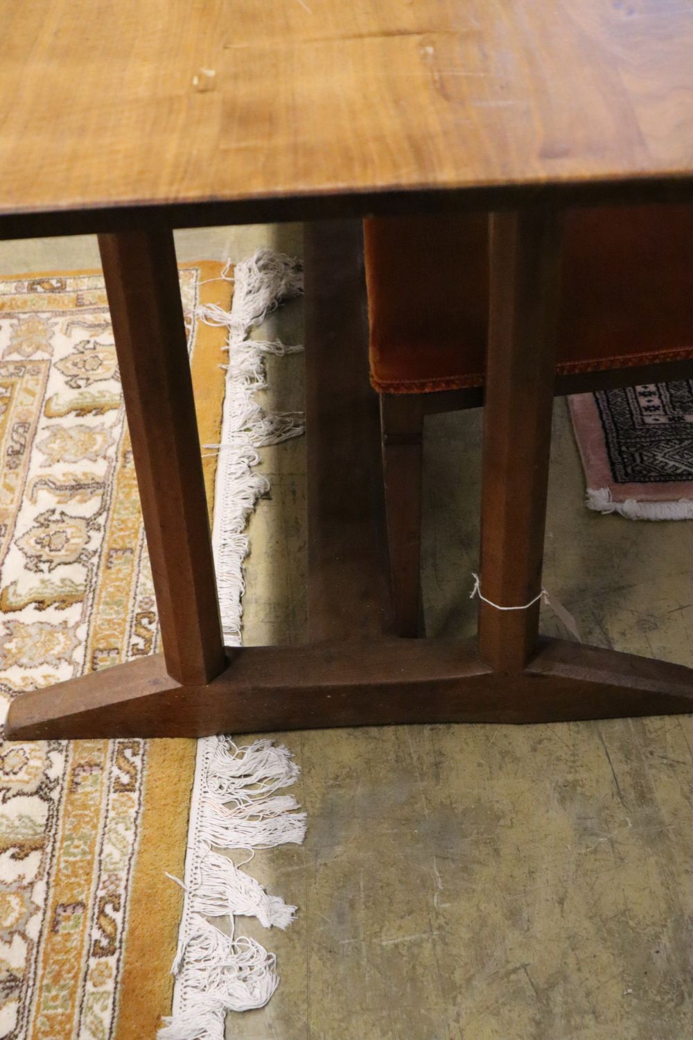 A Gordon Russell walnut dining table, circa 1930, on chamfered double end supports and central - Image 3 of 3