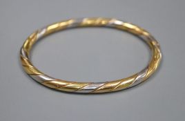 A modern Italian three colour 750 yellow metal hinged bangle, 20 grams.