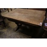 An Elizabethan style oak draw leaf extending dining table, 210cm extended width 80cm height 75cm