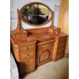 A late Victorian inlaid burr and pollard oak inverse breakfront dressing chest, width 146cm depth