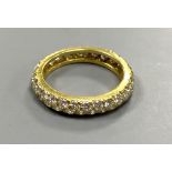 A modern Van Cleef & Arpels 750 yellow metal and two row diamond eternity ring, signed, size K,