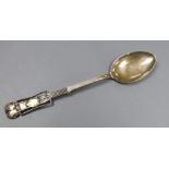An Edwardian Art Nouveau Liberty & Co Cymric silver coffee spoon, with stylised terminal,