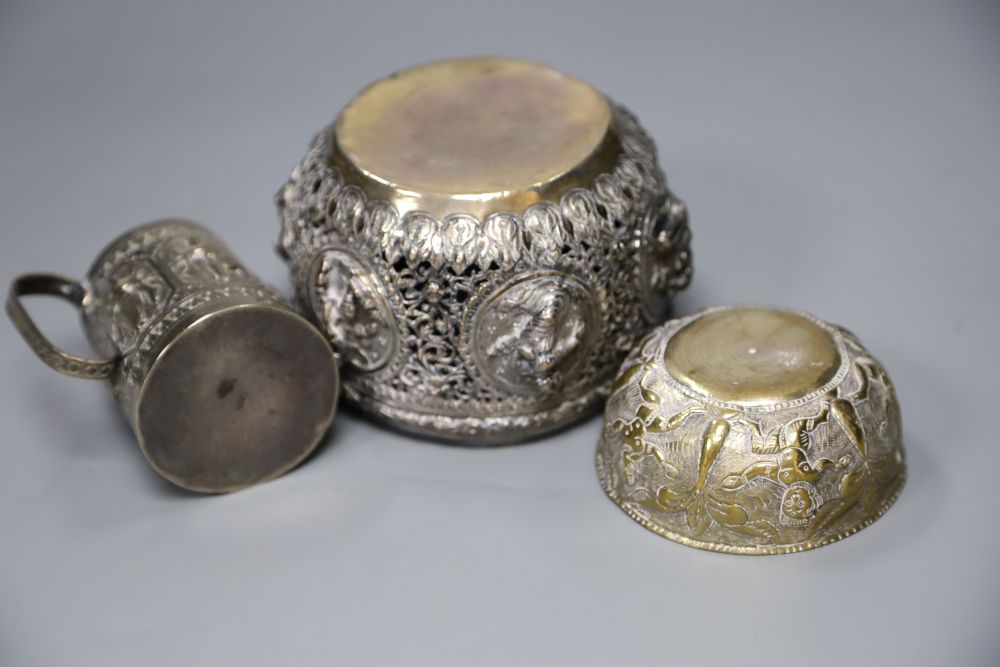 A 19th century Indian white metal embossed sugar bowl, a christening mug and a small brass bowl. ( - Image 4 of 4