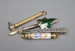 Four assorted pencils, including three enamelled and novelty modelled as an axe.