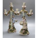 A pair of 19th century Sitzendorf figural candelabra, height 43cmCONDITION: Four of the pendant
