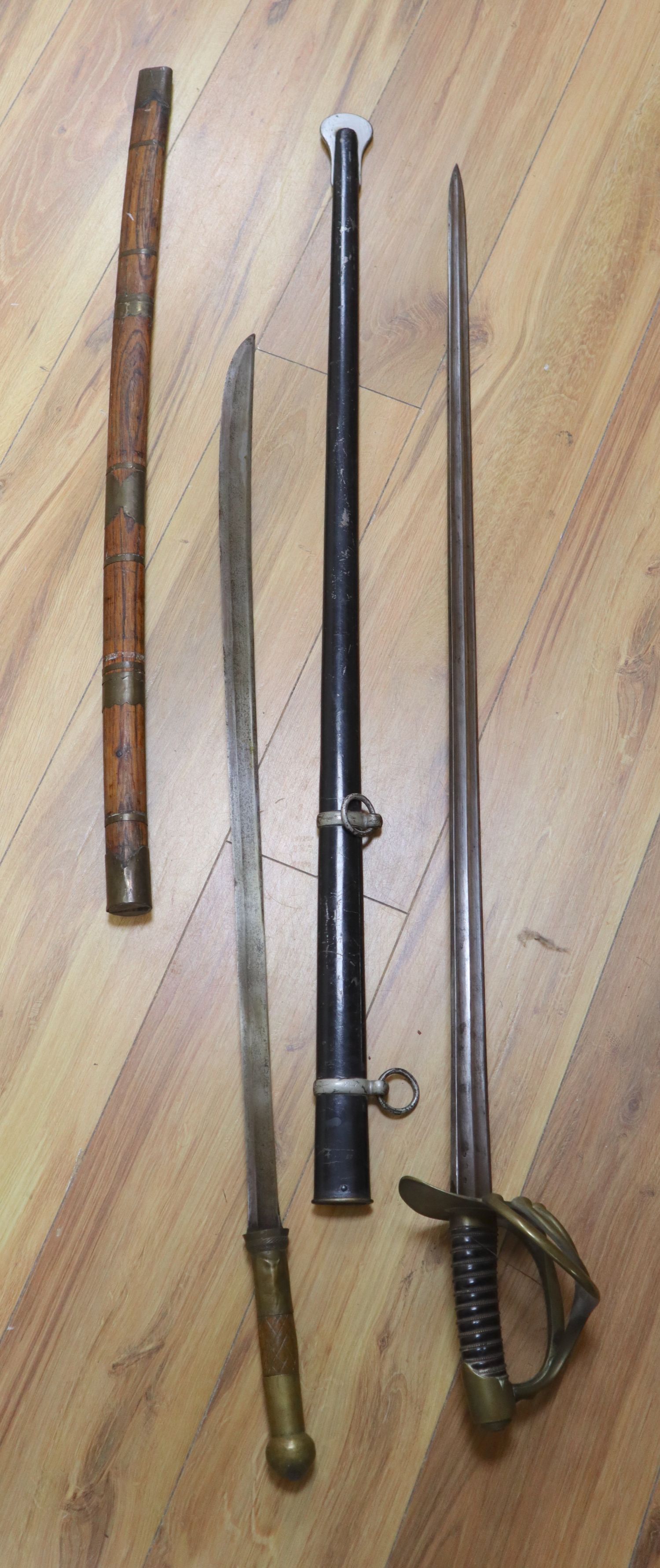 A French Cuirassier sword, blade 93cm, together with an Eastern brass mounted sword with wooden - Image 2 of 2