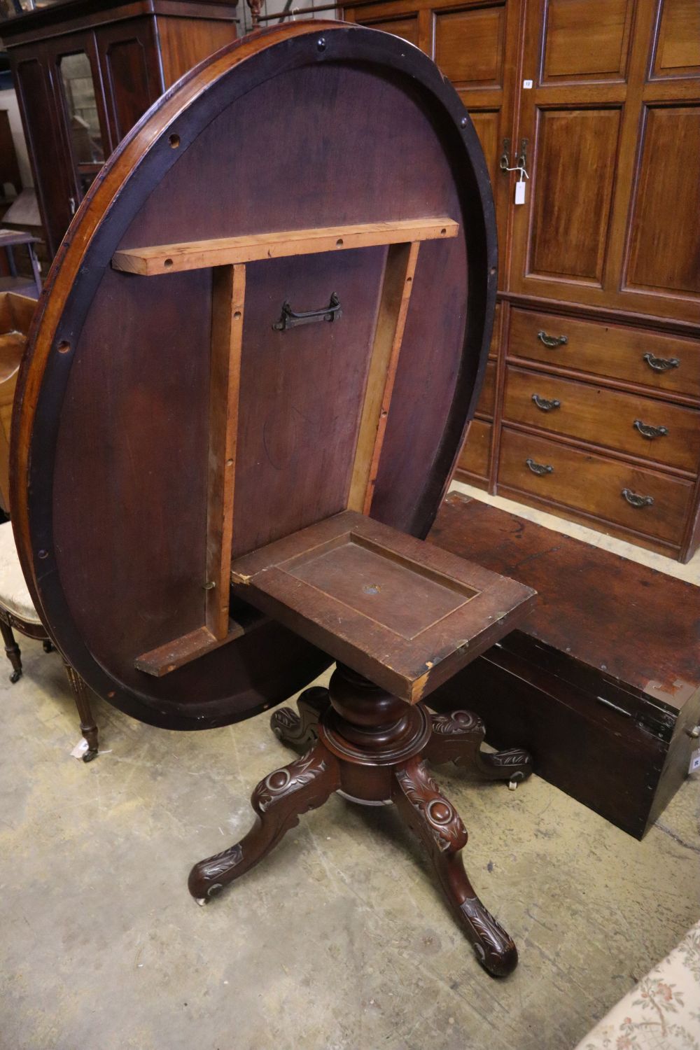 A Victorian mahogany tilt-top oval loo table, width 134cm depth 100cm height 74cm - Image 3 of 4