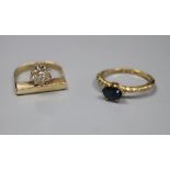 A modern yellow metal and solitaire diamond ring, size G, gross 4.5 grams and a sapphire set ring.