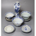 A Chinese blue and white baluster vase, 17cm, three Chinese bowls and four stands