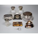 Eight assorted silver and tortoiseshell items including trinket box, scent bottles, timepiece and