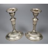 A pair of late Victorian silver oval candlesticks, Thomas Bradbury & Sons, London, 1896, weighted,